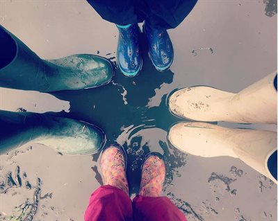 Rosie, Dave and the girls out in their wellies
